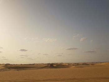 Scenic view of desert against sky