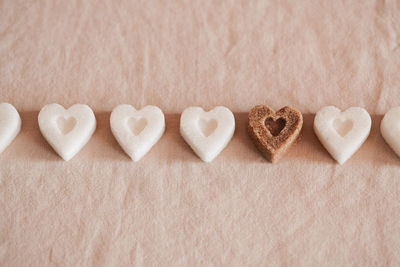 High angle view of heart shape over white background
