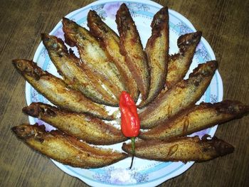 High angle view of pineapple in plate on table