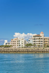 Condominium chatanmonogatari bayside and harbor park in the vicinity of american village in okinawa.