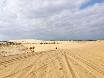 Scenic view of desert against sky