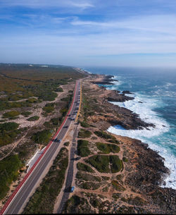 High angle view of road by sea against sky