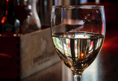 Close-up of wineglass on table