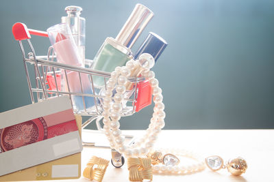 Close-up of personal accessories on table