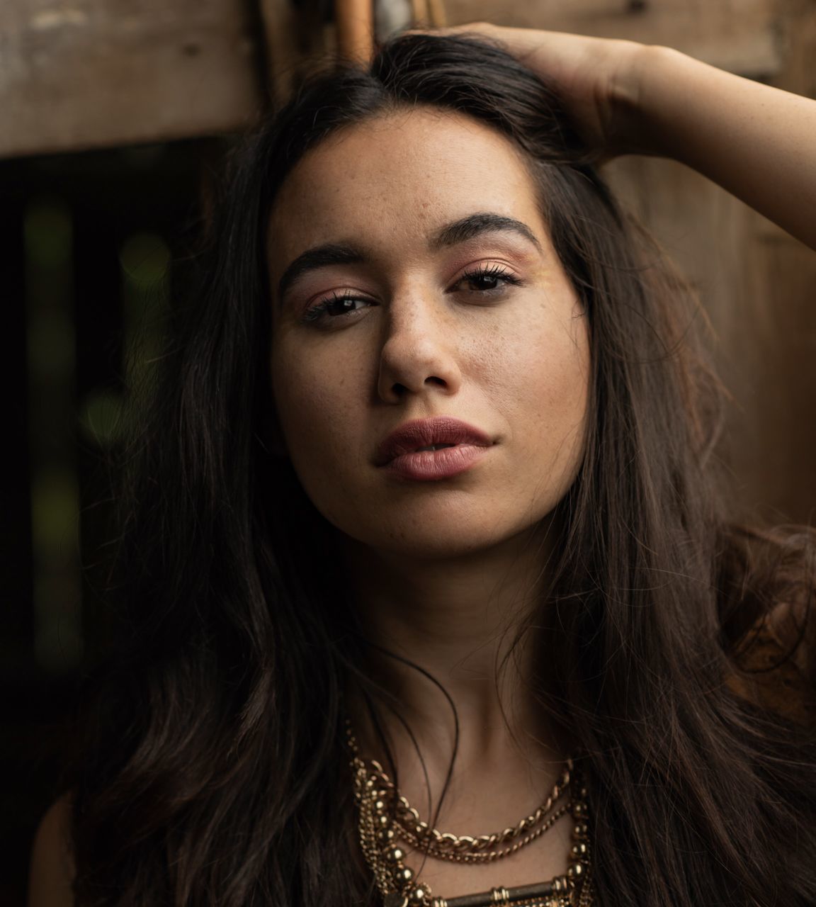 portrait, headshot, young adult, young women, front view, long hair, one person, hair, hairstyle, real people, looking at camera, focus on foreground, lifestyles, beautiful woman, women, leisure activity, beauty, jewelry, close-up