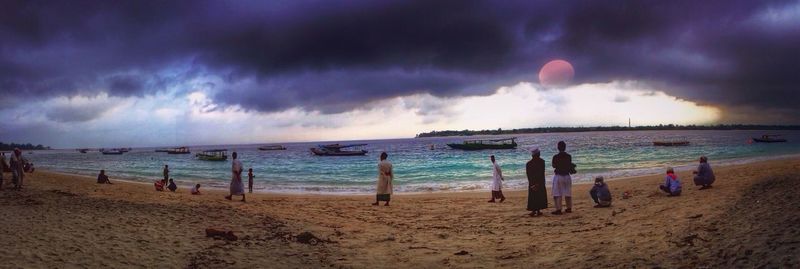 Scenic view of sea against cloudy sky