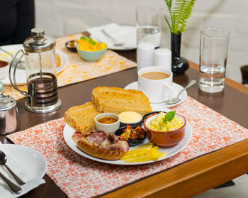 High angle view of breakfast served on table