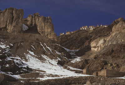 Scenic view of rocky mountains against sky