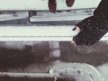 Woman standing in pond