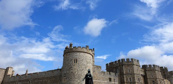 Low angle view of fort against blue sky