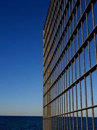 Low angle view of skyscraper against clear sky