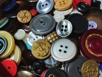 Directly above shot of various buttons on table