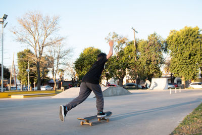 Young skateboarder in skatepark