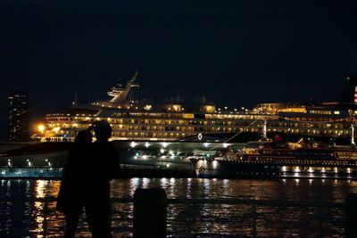 Illuminated cityscape at night