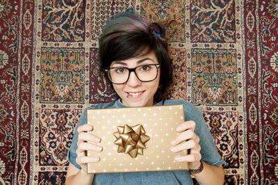 Portrait of young woman wearing mask