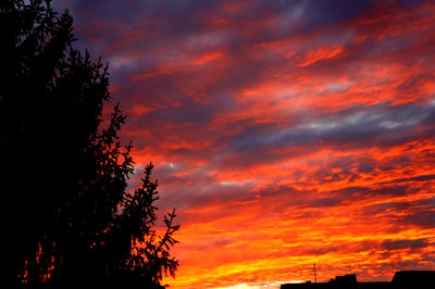 Low angle view of cloudy sky at sunset