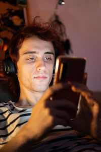 Portrait of mature man using smart phone