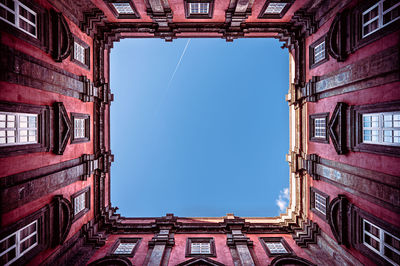 Low angle view of buildings against clear sky