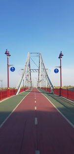 View of bridge against clear blue sky
