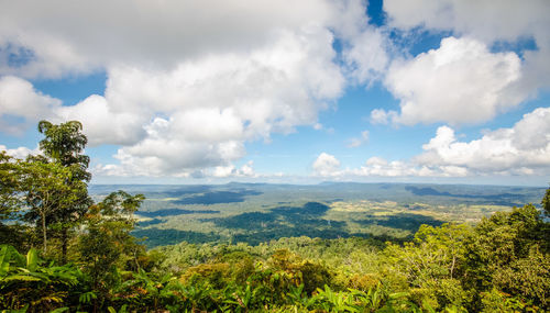 Scenic view of landscape against cloudy sky