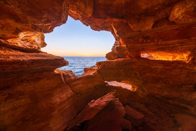 Sea seen through rock formations