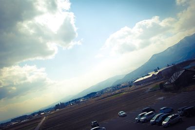 Panoramic view of road against cloudy sky