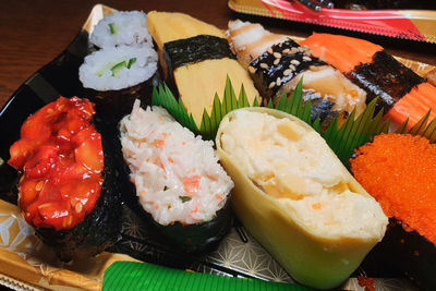 High angle view of sushi served on table