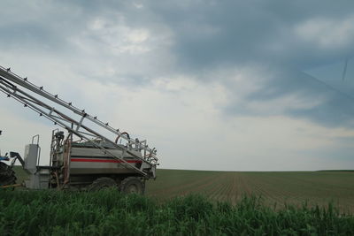 View of agricultural field against sky