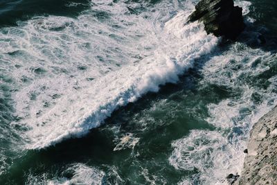 High angle view of waves in sea