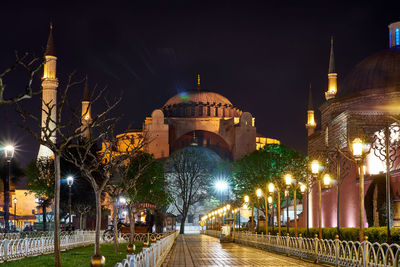 View of illuminated buildings at night