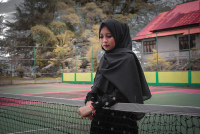 Full length of a young woman playing soccer