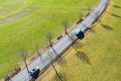 High angle view of road amidst field