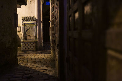 Alley amidst buildings in city