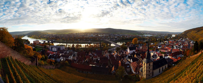 Panoramic view of crowd against sky