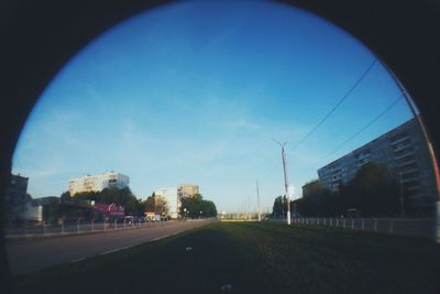 View of road along buildings