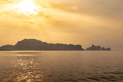 Beautiful sunset at phra nang beach, krabi province, thailand.