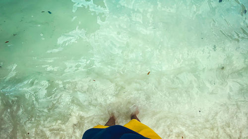 Man swimming in sea