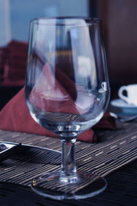 Close-up of wine in glass on table