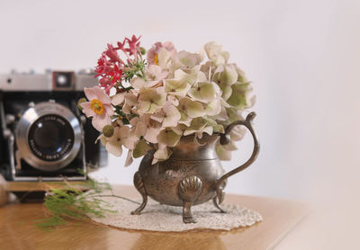 Close-up of flowers on table