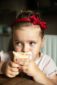 Close-up of woman holding food