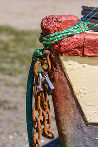 Close-up of rope tied on metal