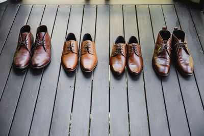 High angle view of leather shoes on table