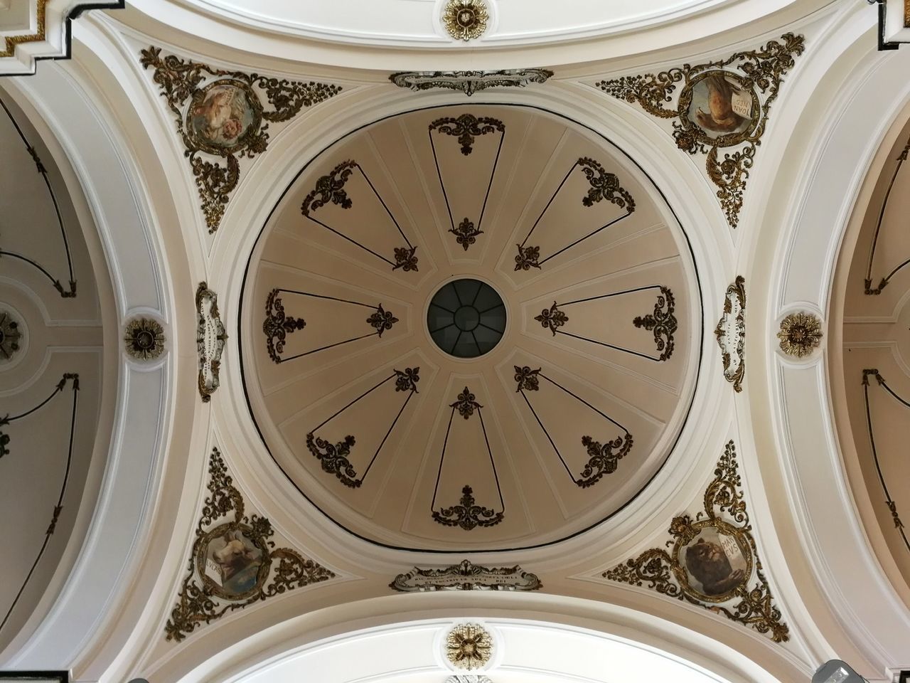 LOW ANGLE VIEW OF ILLUMINATED CEILING OF BUILDING