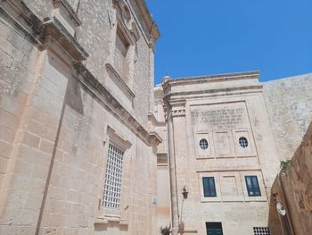 Low angle view of historical building against sky