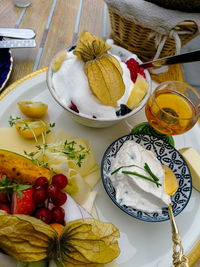 High angle view of fruits in plate on table