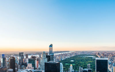 Aerial view of cityscape against clear sky