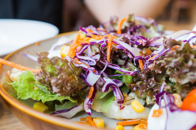 Close-up of salad in plate on table