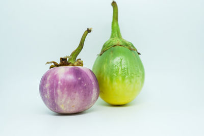 Close-up of fruits against white background