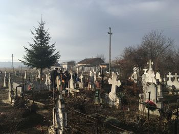 Panoramic view of cemetery against sky