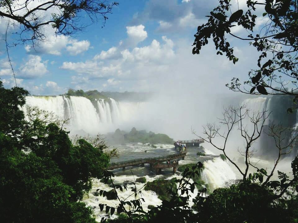 PANORAMIC SHOT OF WATERFALL AGAINST SKY